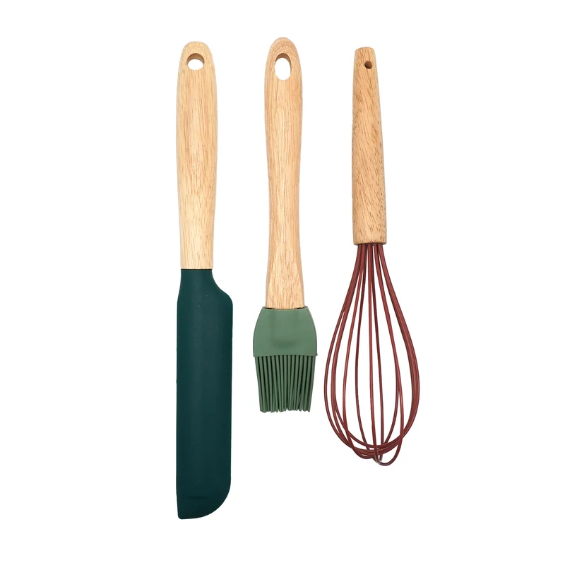 Set utensili per la preparazione di dolci Natalizi. Parte funzionale in silicone e manico in legno.